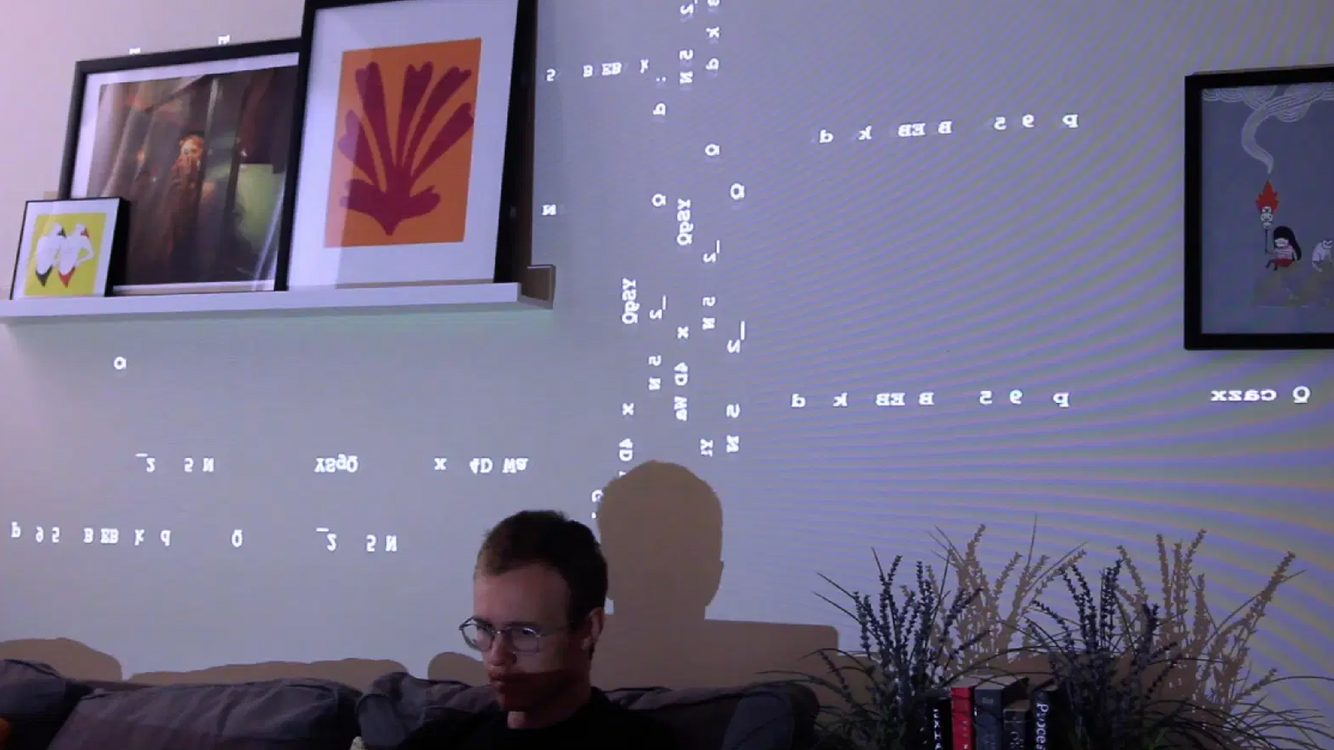 All Connecting projected words and lines across a room